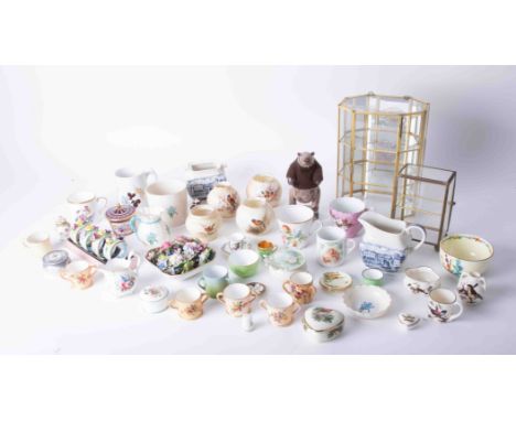 An assortment of various chinaware's and ornaments including miniatures, Crown Staffordshire vases, etc, A bagware WH Goss po