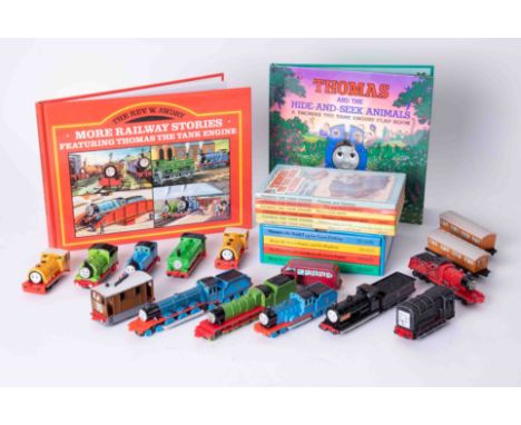 A collection of Thomas The Tank Engine models and books (list available)