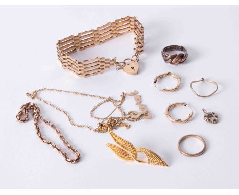 A 9ct gold gate bracelet together with other 9ct gold jewellery (approx. 35.2g), also a yellow metal brooch.