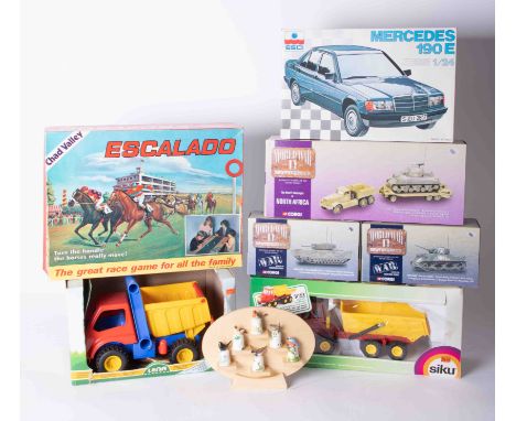 A mixed collection of boxed models including Corgi World War II Collection, Siku truck, scale model of a Mercedes, also Escal