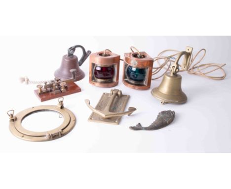 Replica nautical items including porthole, ships bells, anchor door knocker, port and starboard lamps, also a cold machine.