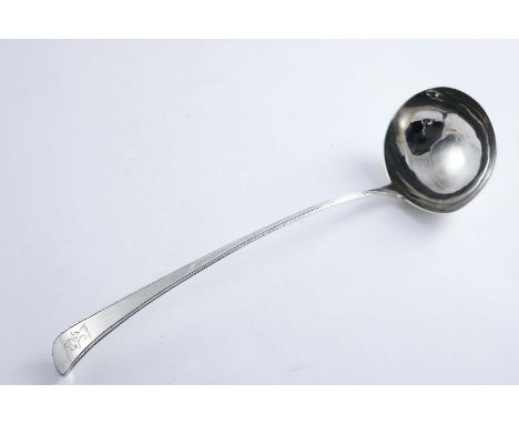 A GEORGE III FEATHER-EDGE PATTERN SOUP LADLE crested, by Hester Bateman, London, 1774;  13.5"  (34.3 cms) long;  5.3 oz
