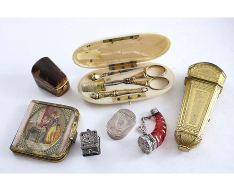 A MIXED LOT:- An 18th century gilt-metal etui case, a Victorian gilt-metal mounted needle case, a tortoiseshell thimble case,