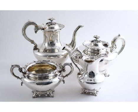 AN EARLY VICTORIAN FOUR-PIECE TEA & COFFEE SERVICE with plain circular bodies, scroll borders & feet and leaf-capped, scroll 