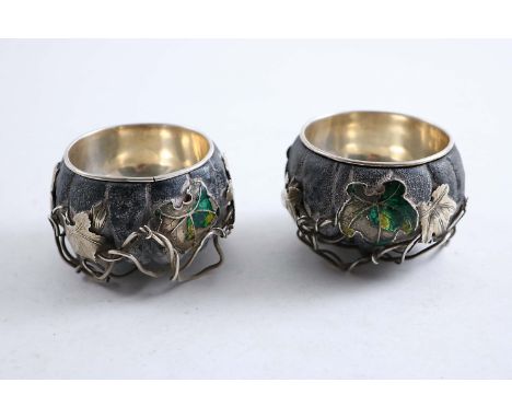 A PAIR OF LATE 19TH / EARLY 20TH CENTURY JAPANESE NATURALISTIC MIXED METAL SALTS in the form of pumpkins with leafy wire tend