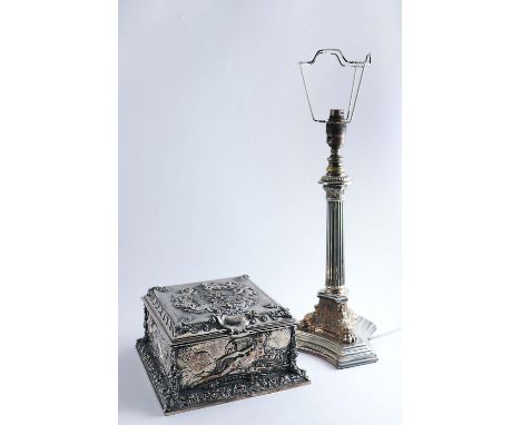 A VICTORIAN ELECTROPLATED DECORATIVE CASKET of square outline with a bevelled cover and base, decorated all over in high reli