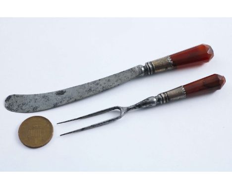 AN EARLY 18TH CENTURY CHILD'S KNIFE & FORK with a steel blade & tines and mounted, faceted agate handles, unmarked c.1700; th