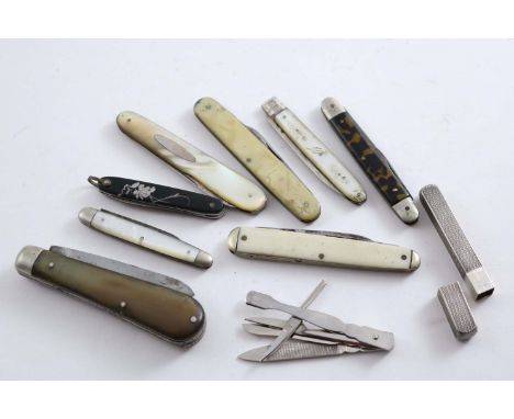 TWO MOTHER OF PEARL MOUNTED FOLDING FRUIT KNIVES Six various steel pocket knives and a pocket, folding plated steel manicure 