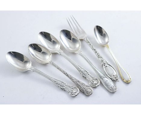 VICTORIAN FLATWARE PATTERNS:- A Wellington pattern tea spoon, crested, a parcelgilt Tamworth pattern tea spoon, a Newton patt