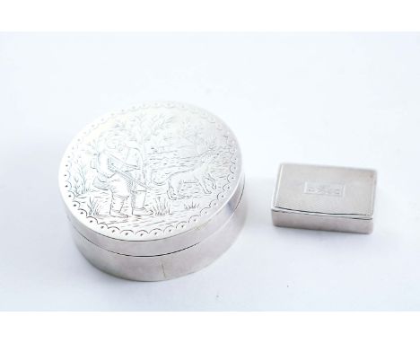 A LATE VICTORIAN BRITANNIA STANDARD CIRCULAR BOX & COVER engraved with a hunting man with his gun & dog in a landscape with t