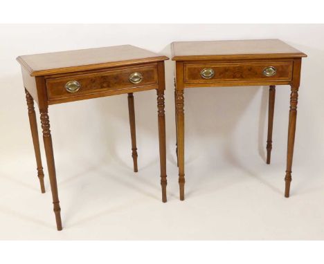 A pair of walnut and figured walnut lamp tables, in the mid-18th century style, each having cross and feather banded tops abo