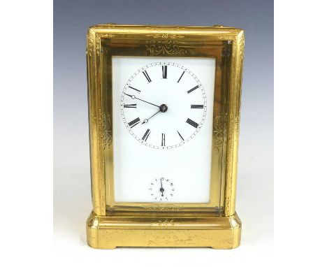 A mid-19th century French gorge case lacquered brass carriage clock with alarm, the case having engraved decoration, bevelled