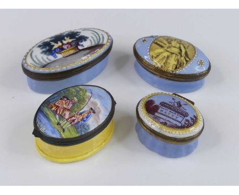 A South Staffordshire enamel patch box, late 18th century, of oval form, decorated with a fishing scene, l.5.5cm, together wi