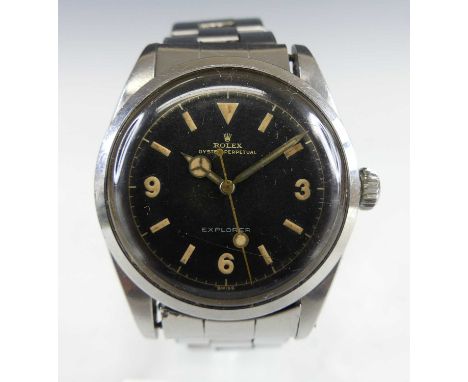 A 1953 gent's Rolex oyster perpetual Explorer steel cased automatic wristwatch, Ref. 6150 No. 945097, the signed black dial w