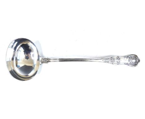 A Victorian silver soup ladle, in the Queens pattern double-struck (to each side), with engraved dove crest, maker The Portla