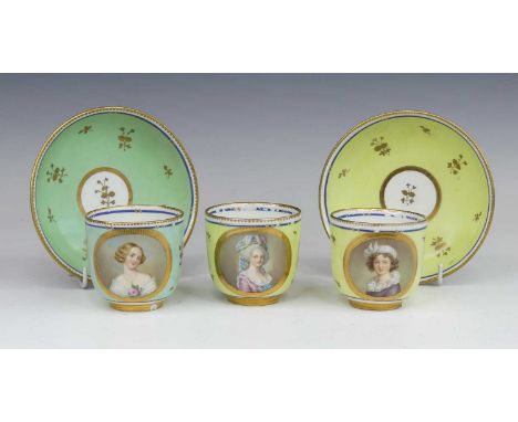 A set of three Vienna porcelain tea cups and two saucers, 19th century, the cups decorated with a portrait of Marie Antoinett