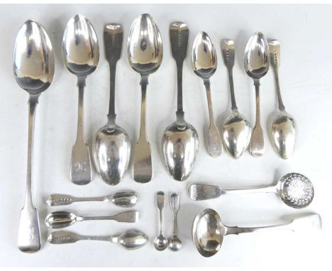 A collection of George III and later silver spoons in the Fiddle pattern, to include tablespoons, teaspoons, salt spoons, sou