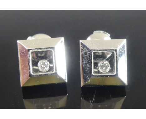  A pair of Chopard 18ct white gold Happy Diamond stud earrings, each having a 2.05mm round brilliant cut diamond within a 10m