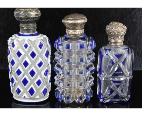 A Victorian scent bottle, the body of oval form with rounded shoulders with blue and white overlaid diamond cut decoration, t
