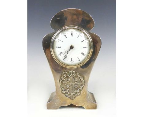 A late Victorian silver cased balloon shaped mantel clock, having an unsigned white enamel convex Roman dial with outer Arabi