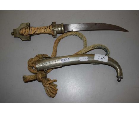 Small dagger in base metal case