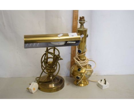 A brass desk lamp together with a further Far Eastern brass table lamp with applied decoration