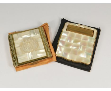 POWDER COMPACTS. A 1950's Stratton powder compact with integral lipstick case, apparently unused. Also, one other 1950's gold
