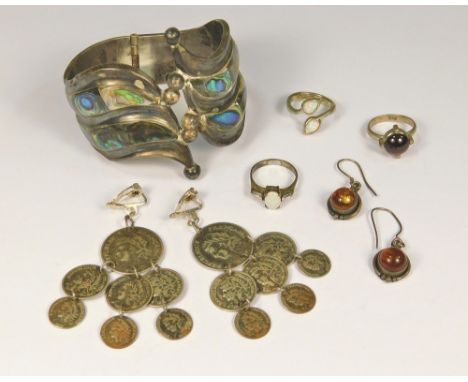 COSTUME JEWELLERY. A Mexican silver &amp; abalone hinged bangle (a.f.), a pair of modern silver &amp; amber earrings, three s