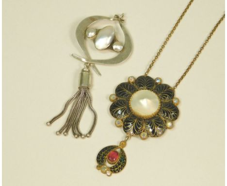 COSTUME JEWELLERY.A gilt metal, mother of pearl & enamel pendant with chain & a silver coloured metal & mother of pearl penda