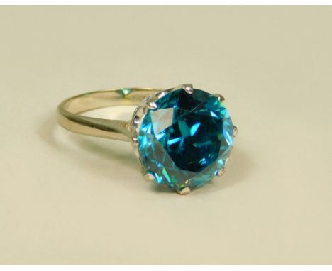 ZIRCON RING. An 18ct. white gold dress ring, set a large zircon. (N).