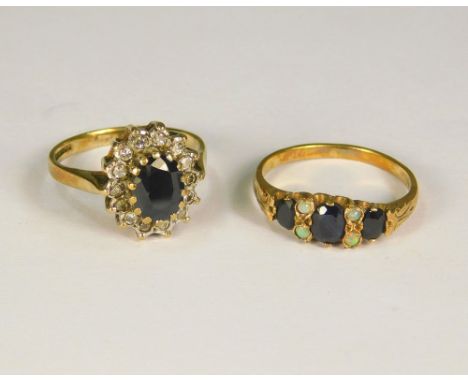 DRESS RINGS. A 9ct. gold sapphire &amp; opal dress ring &amp; one other 9ct. gold cluster dress ring.