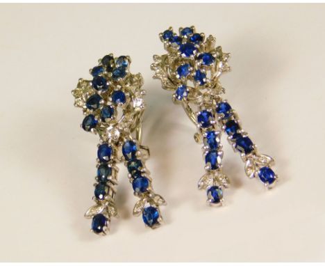 SAPPHIRE EARRINGS. A pair of sapphire &amp; diamond pendant ear drops, set in 18k. white gold. With post &amp; clip fittings.