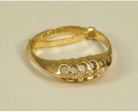 GOLD RING. An 18ct. gold ring set with five old cut diamonds. Chester 1918.