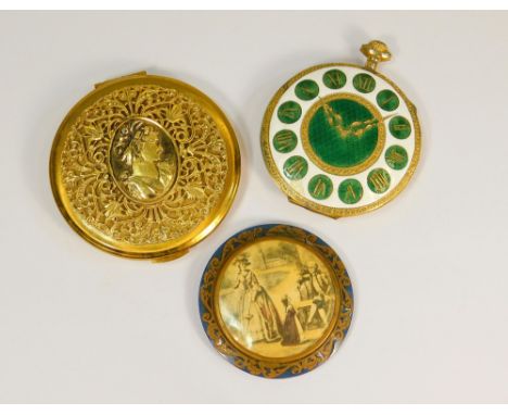 POWDER COMPACTS.An Italian gold tone powder compact, enamelled with a clock dial & two other powder compacts.