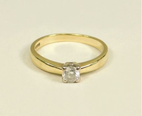 DIAMOND RING. An 18ct. gold solitaire diamond ring. The brilliant cut stone of approx. 0.25ct. spread in a square setting. (M