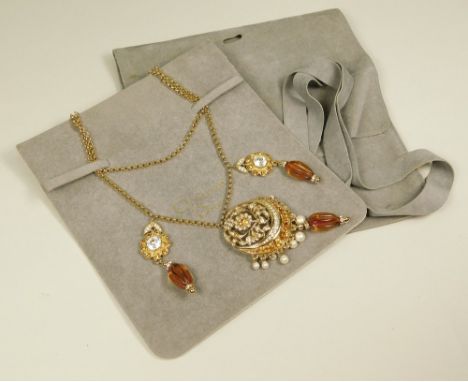 CHRISTIAN DIOR.A Christian Dior paste & gold tone necklace (undated), on original card & with pouch. Length of drop approx. 4