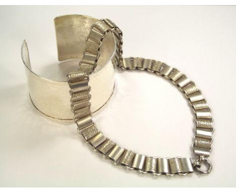 SILVER BANGLE ETC. A handmade hammered silver cuff bangle, 4.3cm, &amp; a late Victorian silver plated necklace.