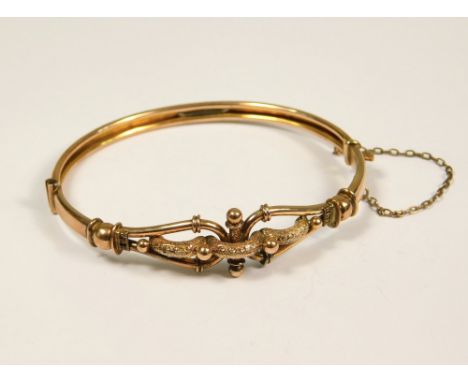 VICTORIAN BANGLE. A 9ct. rose gold Victorian hinged bangle. Approx. 8.3g. (NOT 10g).