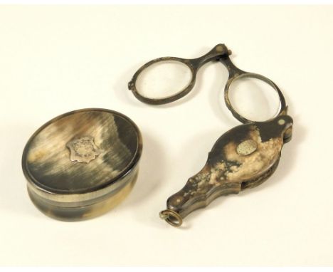 HORN BOX ETC.A 19th century horn snuff box with silver cartouche & a pair of horn folding lorgnettes.