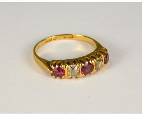 GOLD RING. AN 18ct. ruby &amp; diamond ring. (J/K).