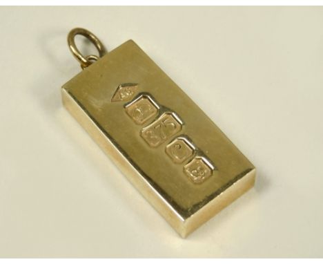 GOLD INGOT. A 9ct. gold ingot. Approx. 60.8g.