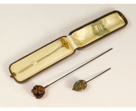 STICK PIN ETC. A Victorian yellow metal stick pin in fitted case &amp; two hat pins (pins reduced).