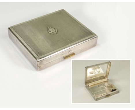 MINAUDERIE.A French Art Deco, silver plated minauderie by Parco, the lid bearing the Parmeter coat of arms. The interior with