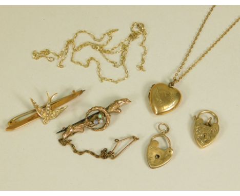 GOLD LOCKET ETC. A gold locket with gold chain, two 9ct. gold bar brooches, two padlock clasps etc.