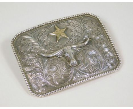 MEXICAN BUCKLE. A Mexican Sterling silver &amp; 14ct. gold plated, engraved belt buckle by Vogt. 8.5 x 6.5cm. Approx. 120g. 4