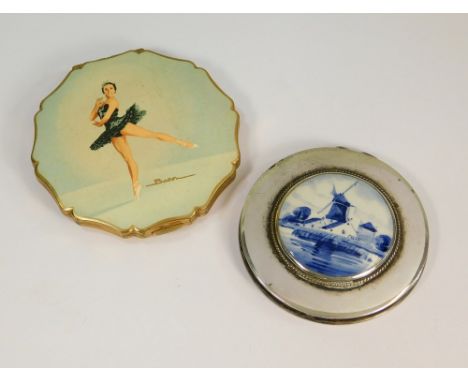 POWDER COMPACTS. A 'Princess' compact, transfer printed with a portrait after Baron. Also, one other compact, the lid inlaid 