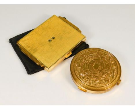POWDER COMPACTS.An Elizabeth Arden, Swiss gold tone powder compact, filled from the base & with winder. Also, a Swiss Agme po