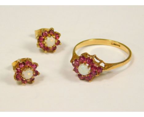 OPAL SET. A 9ct. gold opal set dress ring, (M) &amp; a pair of matching ear studs.