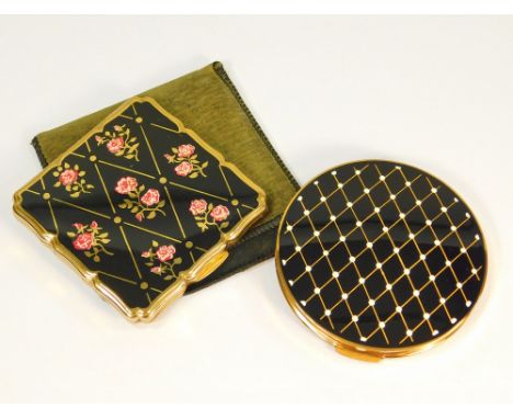 POWDER COMPACTS.A Stratton gold tone & rose enamelled powder compact & one other Stratton enamelled compact, both apparently 