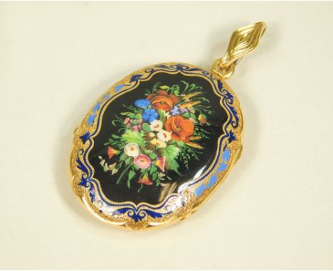 ENAMELLED LOCKET.An oval locket, the front well enamelled with a floral arrangement within a blue enamel border. Length incl.